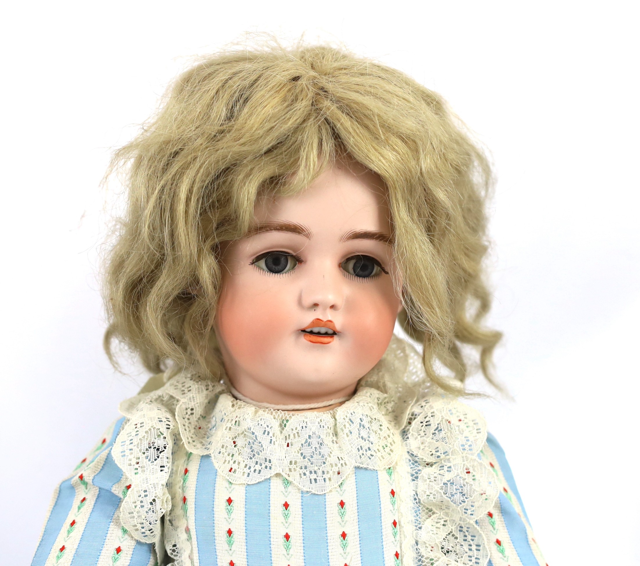 A Simon & Halbig bisque doll, German, circa 1892, 22in.